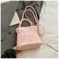 Pink suede crossbody bucket bag featuring unique woven detail and circular top handle - Pink Without Pendant