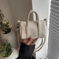 Mini cream-white pillow bag in lychee pattern faux leather with dual top handles - Off White
