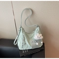 Detail of mint green nylon hobo bag with pleated texture and cloud plush charm - Green