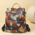 Rucksack aus PU-Leder mit Patchwork-Muster, Krokoprägung und dekorativem Fransen - Color Block
