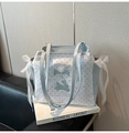 Detail of light blue polka dot tote bag with cute rabbit embroidery and lace bows - Blue