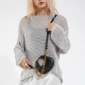 Modern black crescent crossbody bag with lychee texture leather and chunky gold chain - Black
