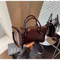 Braune Handtasche aus Öl-Wachs-Leder mit geknoteten Griffen und Umhängeriemen - Kaffeebraun