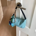 Light blue woven handbag with leather elephant charm and silver heart pendant detail - Blue With Pendant
