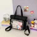 Versatile black nylon ita bag with a large clear PVC window and adjustable straps - Black