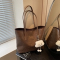 Dark brown embossed leather tote bag with a plush cloud pendant and stylish finish - With Pendant / Brown