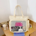 Off-white large capacity ita bag tote with clear PVC front window and plush charms - Off White