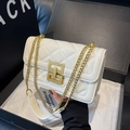 Elegant white quilted crossbody bag with gold chain strap and square buckle detail - Off-white