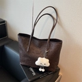Brown embossed PU leather tote bag with cartoon patterns and a white plush charm - With Pendant / Brown