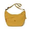 Detail of mustard yellow crescent crossbody bag with adjustable strap and logo detail - Yellow