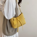 Bright yellow woven shoulder bag featuring cross-weave faux leather and a long strap - Yellow