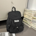 Minimalist black canvas student backpack with MASMA RULEZ label and waterproof finish - Black