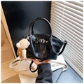 Black crocodile embossed leather bucket bag with cute bear charm and top handle - Black with Pendant