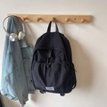 Mochila negra minimalista de gran capacidad con estilo techwear para estudiantes - Negro