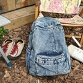 Sac à dos vintage en denim bleu délavé avec grande poche avant pour le plein air - Bleu