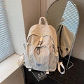 Cream white minimalist nylon backpack for women with drawstring pockets and tag - Off-white