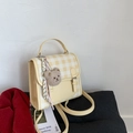 Yellow and white checkered crossbody bag with adjustable strap and bear pendant - With Charm / Yellow