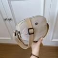 Minimalist beige nylon crossbody bag with dual zippers and adjustable wide strap - Off-white