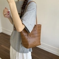 Brown hollow-out faux leather tote bag with laser-cut geometric patterns and dual straps - Brown