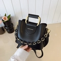 Elegant black bucket bag with gold U-shaped handle and fashion chain decoration - Black