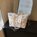 Bolso tote grande con coloridos graffitis de dibujos animados y asas blancas elegantes - Blanco
