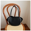 Detail of black woven tote bag with white drawstring on a classic wooden chair - Black