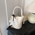White hollow bucket tote bag with yellow lining and floral charm for women - Off White