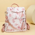 Chic women's butterfly print backpack in white and pink with stylish tassel accessory - Pink