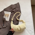 Pale yellow crescent bag with pleated leather texture and stylish knot shoulder strap - Yellow Without Pendant