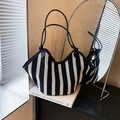 Classic black and white striped woven tote bag with slim black shoulder straps for women - Black