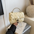 Chic beige quilted crossbody bag with a braided chain handle and a silver swivel lock - Yellow