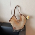 Natural straw tote bag with brown leather straps and a heart-shaped charm detail - Brown