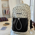 Cream student backpack with black star pattern and contrast pocket for school use - Black (Without Charm)
