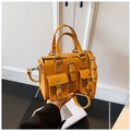 Chic bright yellow moto-style handbag with silver buckles and adjustable shoulder strap - Yellow