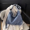 Blue denim hobo shoulder bag with frayed edges and a vintage washed finish - Sky Blue