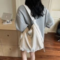 Minimalist beige waffle knit tote bag with adjustable wide strap for casual daily use - Off White