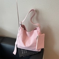 Pink checkered canvas tote bag with small matching pouch in a lifestyle setting - Pink