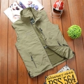 Close-up of army green outdoor vest showing zipper pockets and breathable mesh lining - M / Khaki