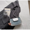 Denim and metallic silver crossbody flap bag on grey blazer for summer fashion style - No Pendant / Silver