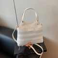Blue and white gradient woven knit bucket bag with long crossbody strap - Light Blue