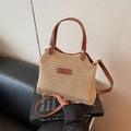 Handwoven straw handbag with brown leather handles and adjustable shoulder strap for summer - Khaki