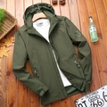 Men's dark green hooded outdoor jacket with chest pocket and lion badge on wood background - XL / Army Green