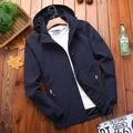 Men's navy hooded windbreaker jacket with zipper pockets on rustic wooden background - 2XL / Blue