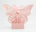 Macro detail of laser-cut pink butterfly wedding candy box with white organza ribbon bow - 50 Pieces / Pink