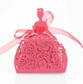 Detail of red hollow laser-cut bridal dress gift box with ribbon bow and crown cutout - Pearlescent Red