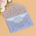Detail of laser-cut lavender wedding invitation with elegant floral hollow pattern - Lilac Purple