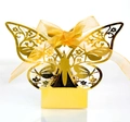 Detail of laser-cut butterfly wedding favor box in reflective gold with a ribbon bow - Reflective Gold