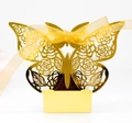 Détail boîte à bonbons papillon ajourée au laser avec ruban en organza doré élégant - Or Réfléchissant