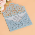 Detailed laser-cut pattern on light blue wedding invitation sleeve with inner card - Fog Blue