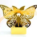 Golden laser-cut butterfly wedding favor box with intricate floral pattern and ribbon - Reflective Gold